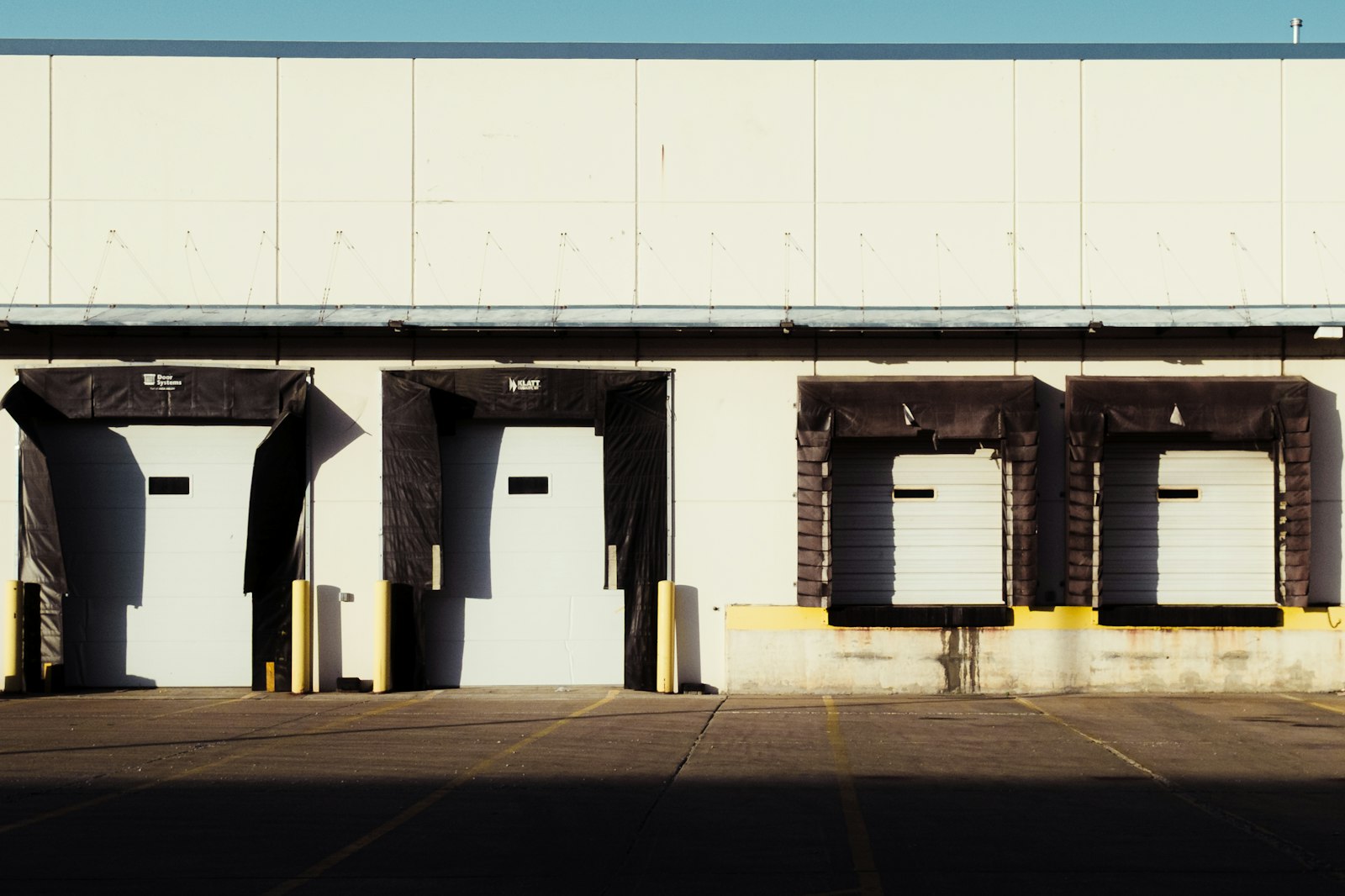 A row of loading docks on a commercial building.