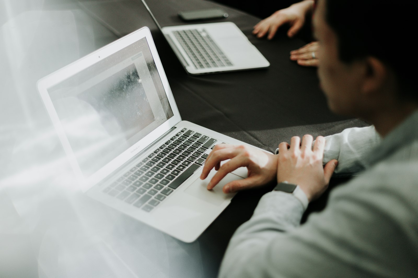 Developer architecting platform integration workflows at a modern engineering workstation