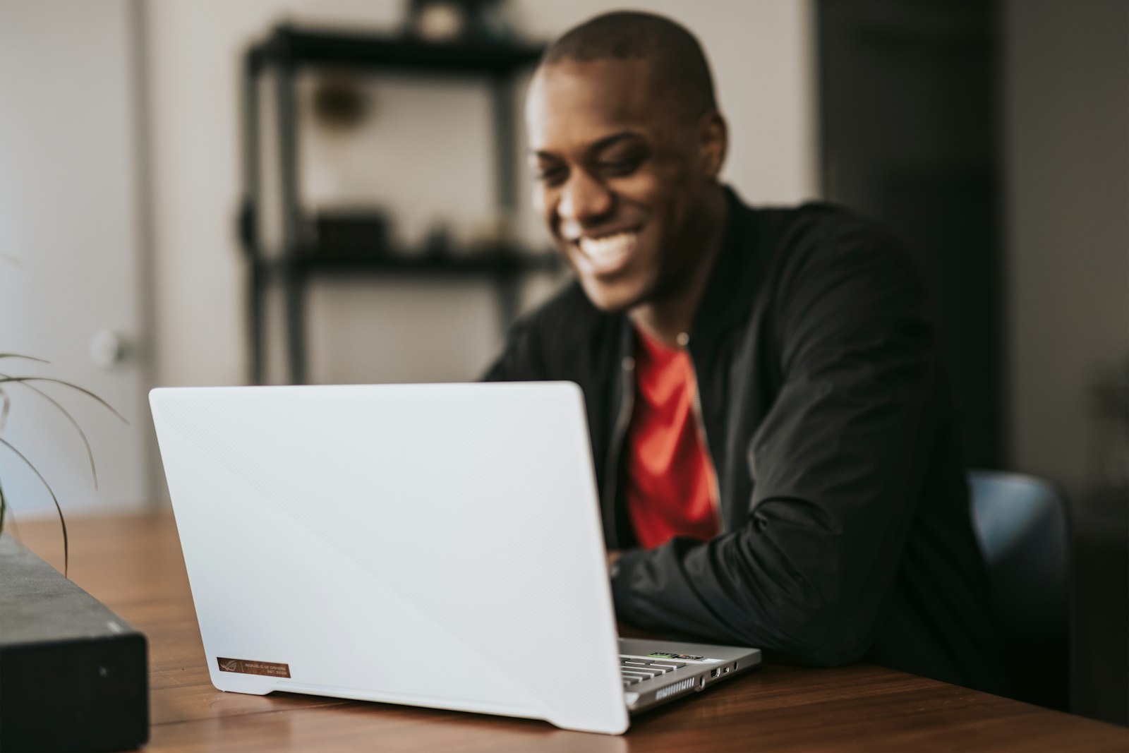 Enterprise data analyst reviewing attribution and governance frameworks at a modern workspace