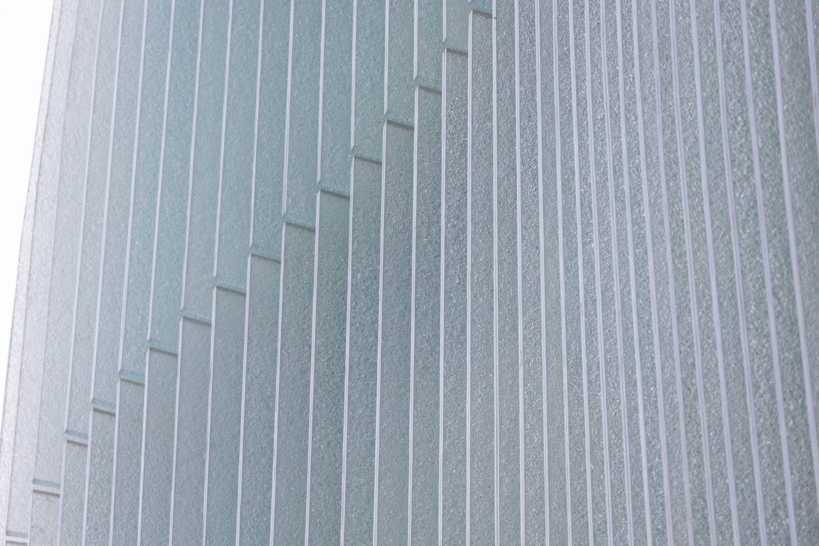 Modern building facade with repeating vertical lines